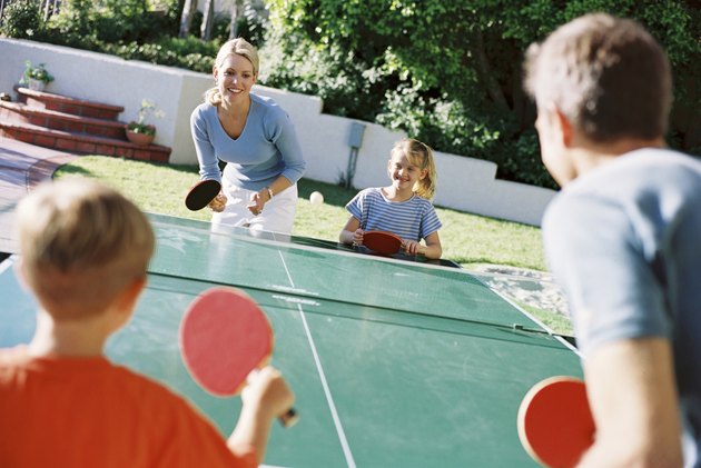 Family playing ping pong