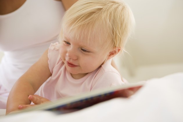 Toddler with book