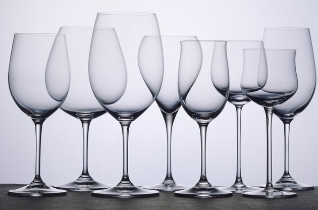 Transparent wine glasses in row, close-up