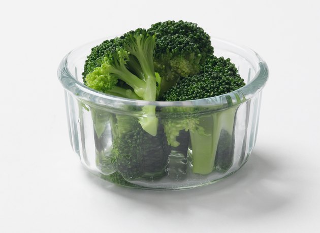 Broccoli in a glass bowl, studio shot