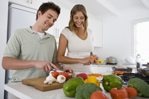 Couple preparing food together