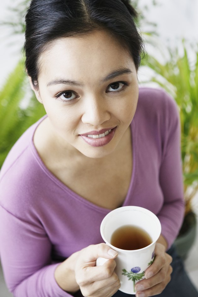 Portrait of Woman with Cup of Tea