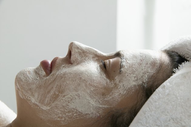 Side profile of a young woman wearing a facial mask