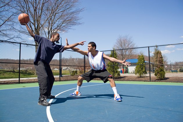 Men Playing Basketball