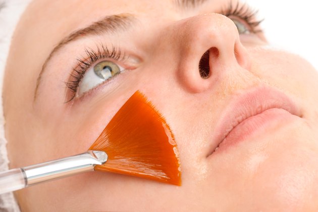 facial peeling mask applying