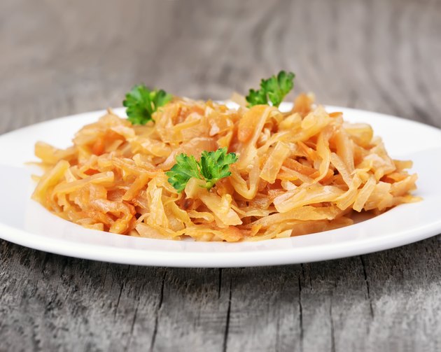 Stew cabbage on rustic table