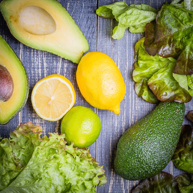 set of salad - lettuce mix, avocado, lemon, lime