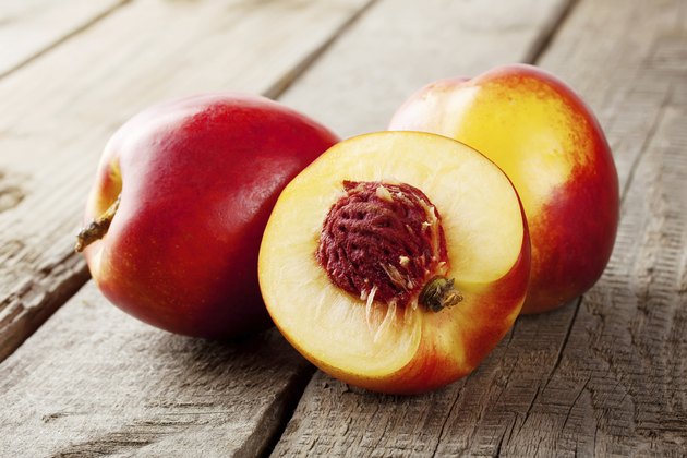 Three ripe juicy nectarine