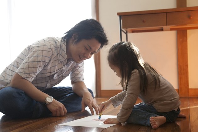 Father and Daughter Drawing Picture