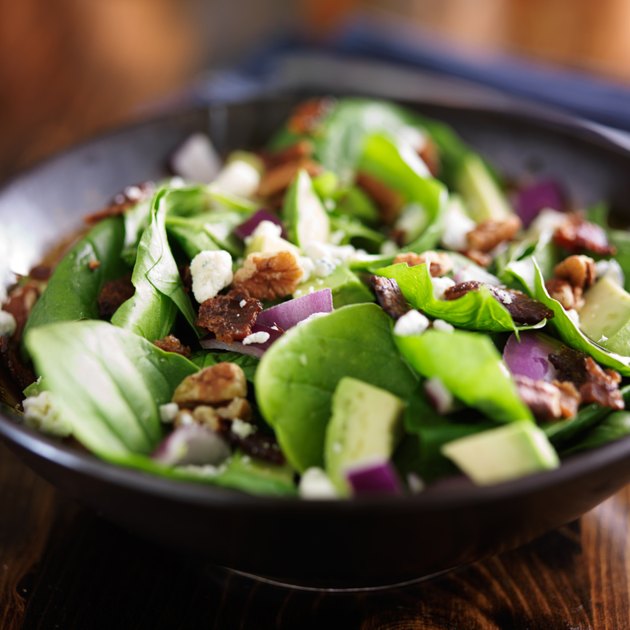 bowl of fresh avocado spinach salad
