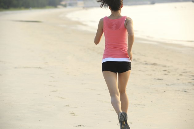 woman running on beach