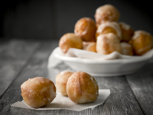 Small homemade doughnuts, also known as doughnut holes