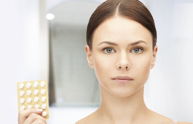 young beautiful woman with pills