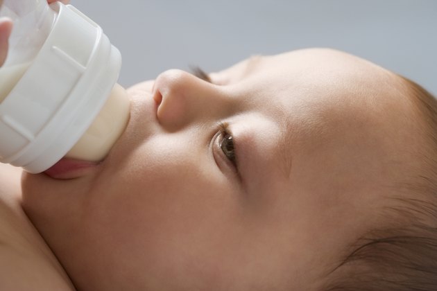 Russian baby drinking from bottle