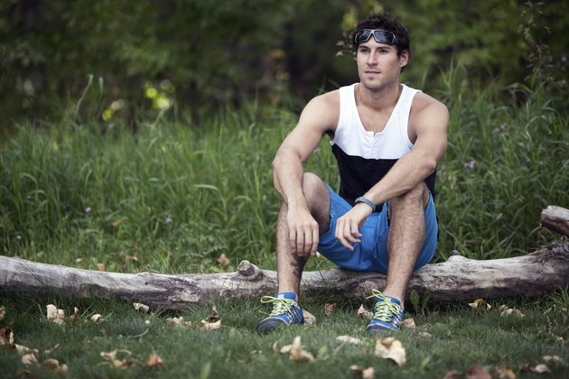 Male Athlete Resting Outside