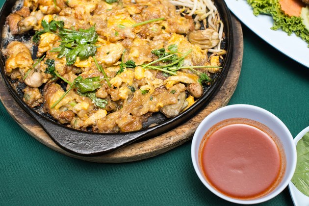 Thai food, fried mussel pancake in hot pan
