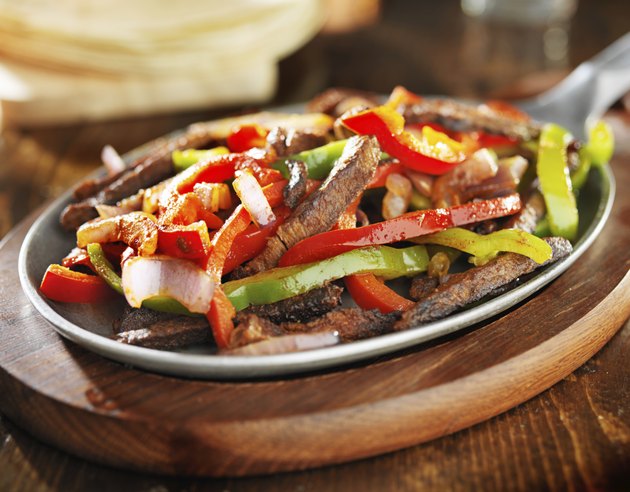 mexican beef fajitas in iron skillet
