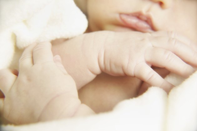 Portrait of a newborns hands and mouth