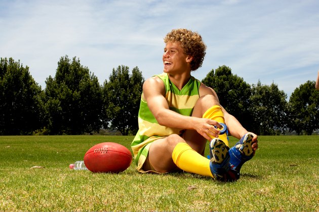 Player taping his boots before a game