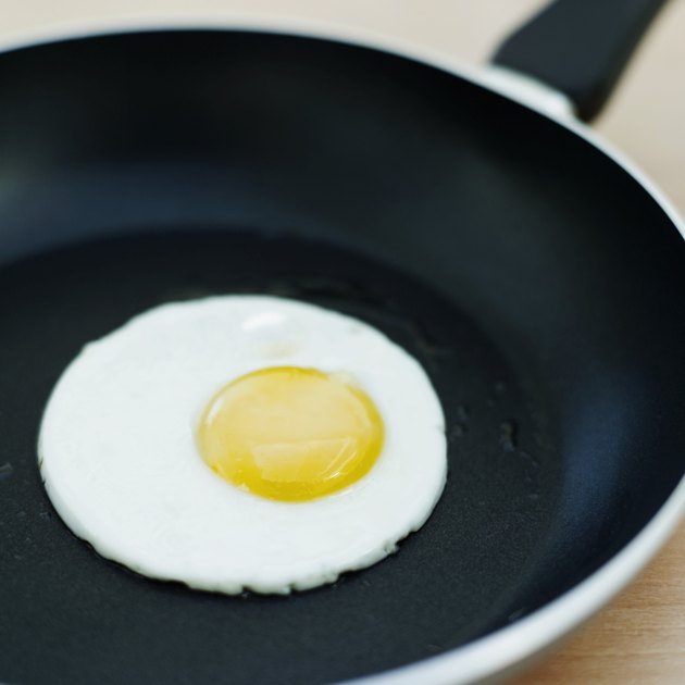 close-up of a fried egg in a frying pan