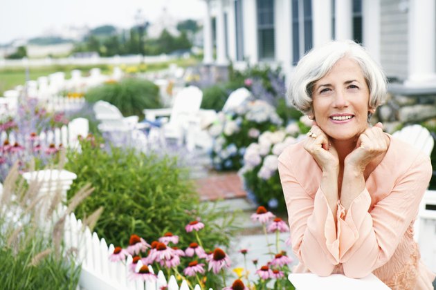 Woman in blooming garden