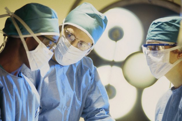 Team of surgeons in operating room
