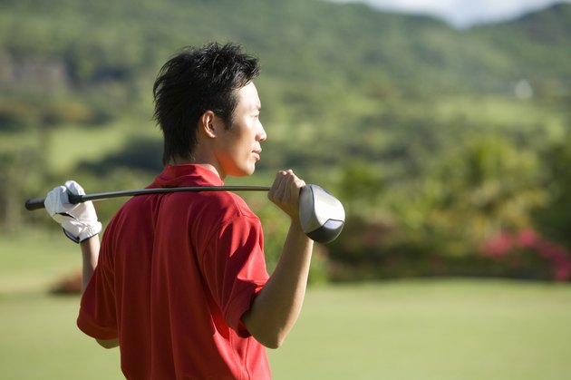 Man Holding Golf Club on His Shoulder