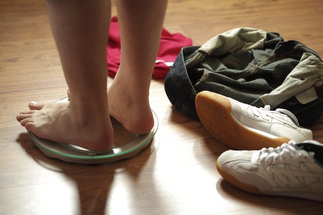 Feet on a weight scale