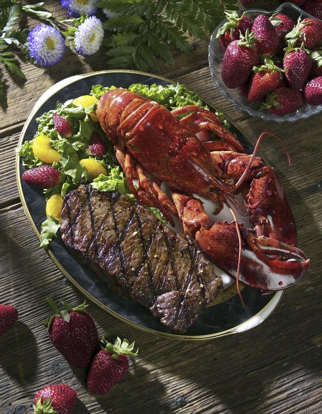 Close-up of seafood and steak on a plate