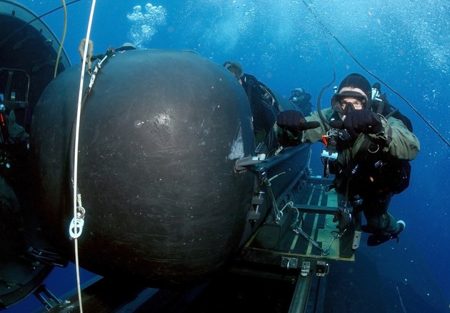 Atlantic Ocean, May 5, 2005 - A member of the SEAL Delivery Vehicle Team prepares to launch one of the team's SEAL Delivery Vehicles (SDV) from the back of the Los Angeles-class attack submarine USS Philadelphia (SSN-690) on a training exercise.