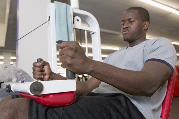 Man using weight machine