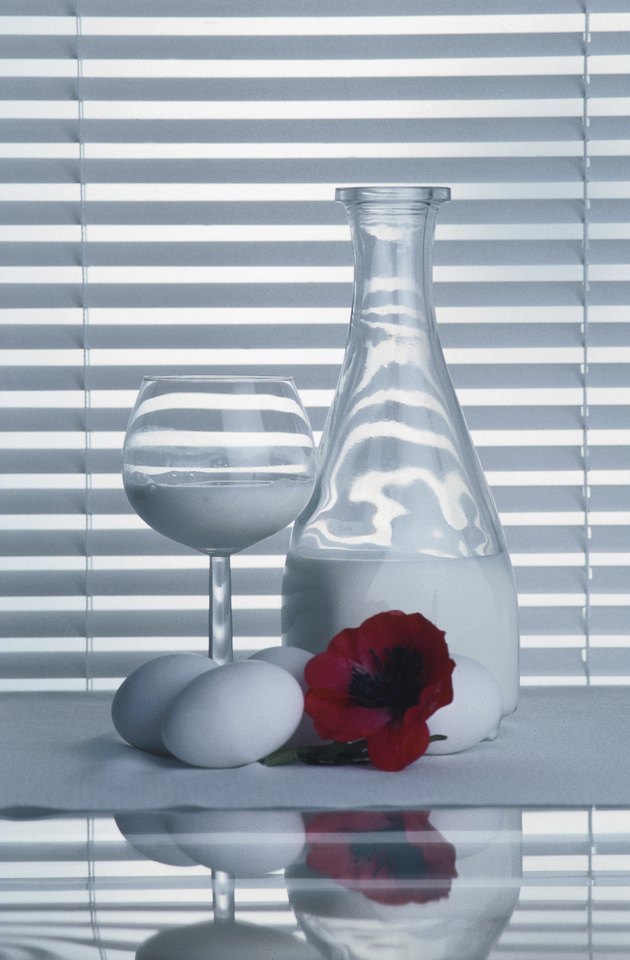 Elegant still life of milk and eggs