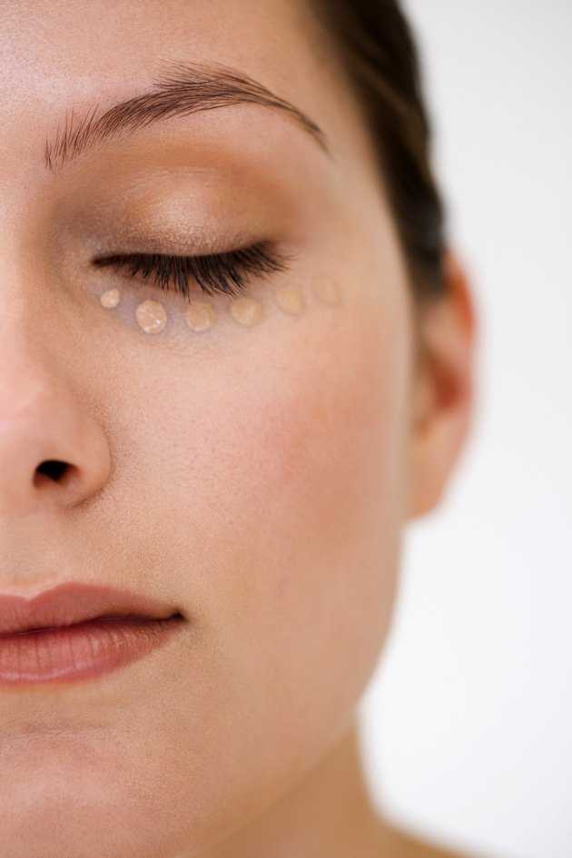 Woman with makeup under eye