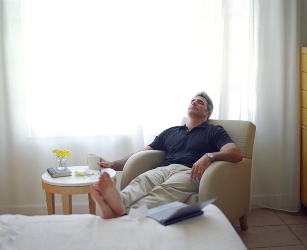 Man relaxing with his feet up