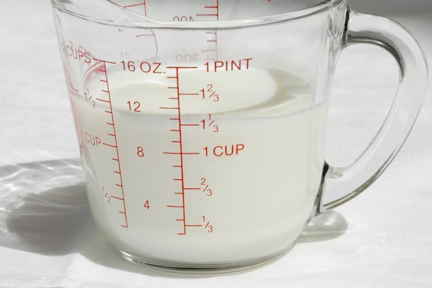 Close-up of a milk in a measurement jug