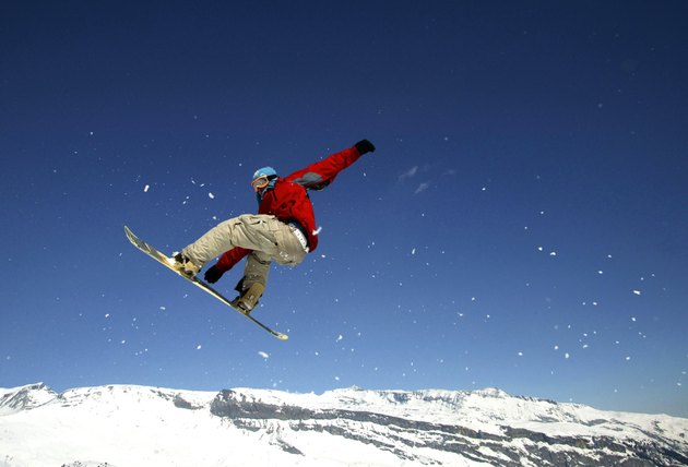Low angle view of a man snowboarding