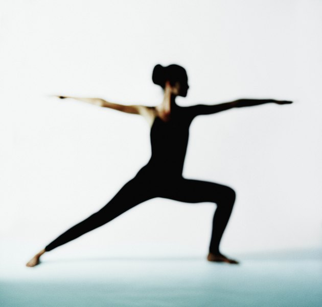 Woman in warrior II yoga position