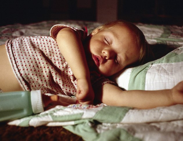 Baby sleeping with bottle