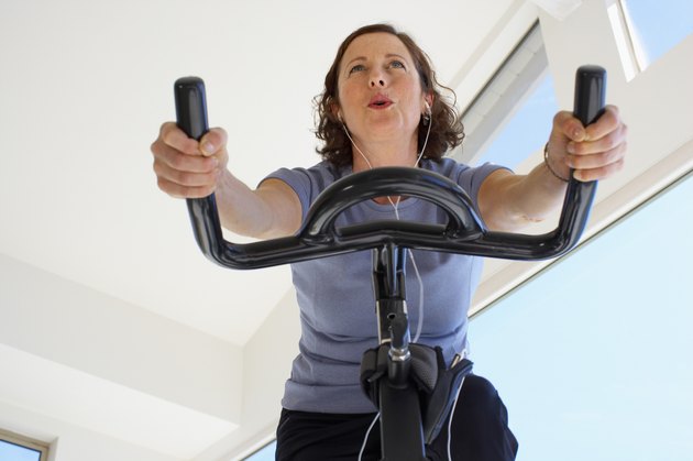 Woman Riding a Stationary Bike