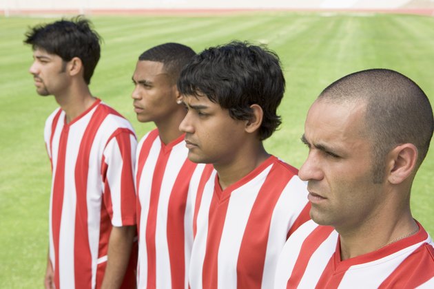Soccer players standing in a row