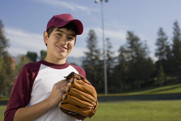 Portrait of boy with baseball mitt