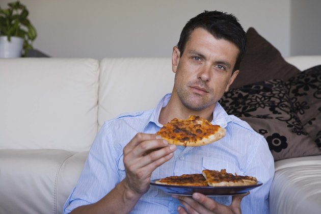 Man eating pizza