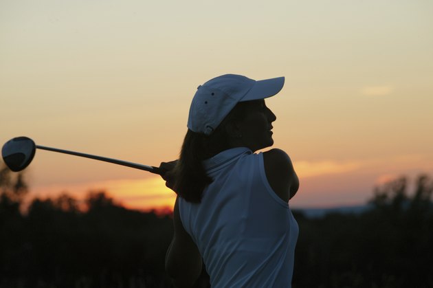 Woman playing golf