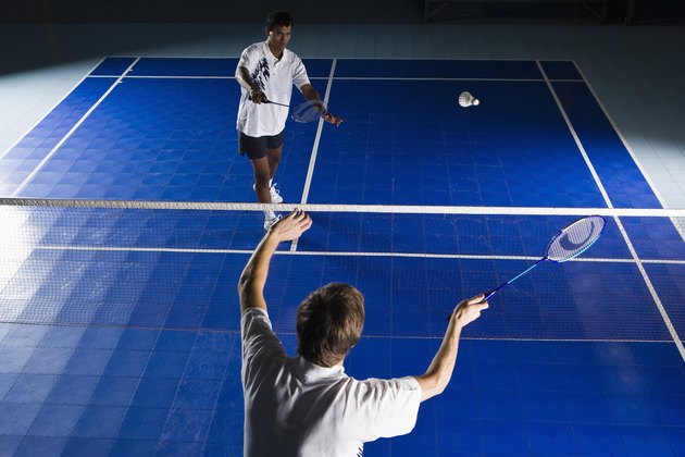 Men playing badminton