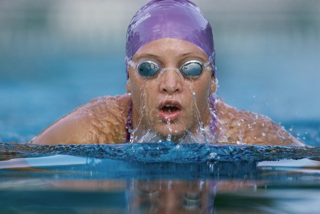 Portrait of a woman swimming in a swimming pool