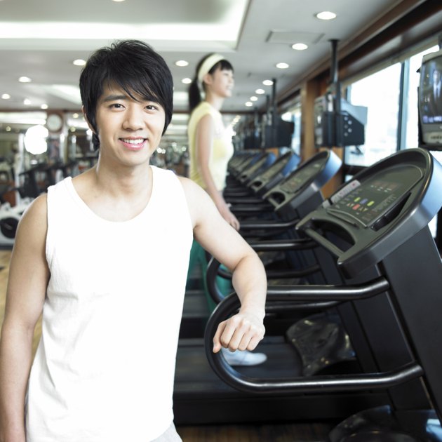 a running man on a running machine at a fitness club