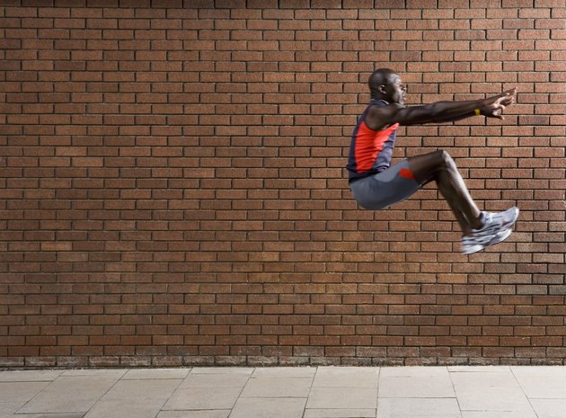 Athlete Performing Long Jump