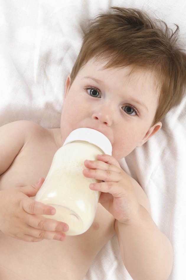 Child with the milk bottle