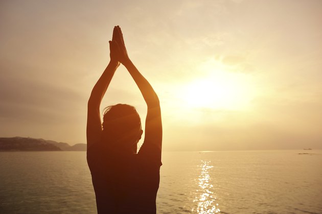 yoga woman sunrise seaside