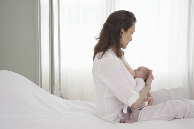 Mother Breastfeeding Newborn Baby